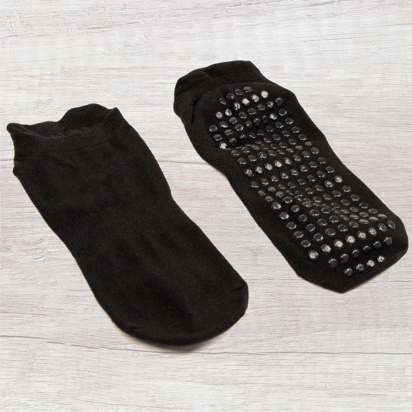 myga Yoga Socken Schwarz Vorder- und Rückseite mit Noppenprofil.