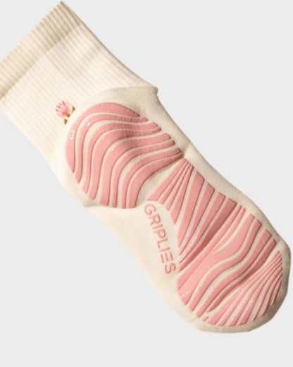 Unterseite von Mid Crew Pilates Socken mit Silikon Grip Sohle in Rosa