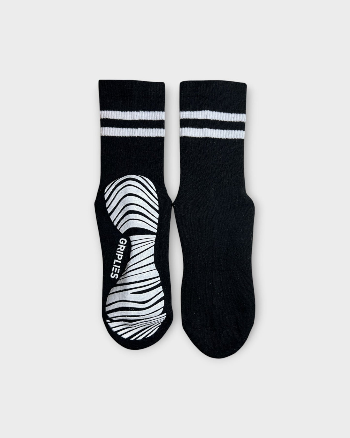 Pilates Socken Damen klassisch schwarz als Crew Socken mit weißen Streifen und Grip