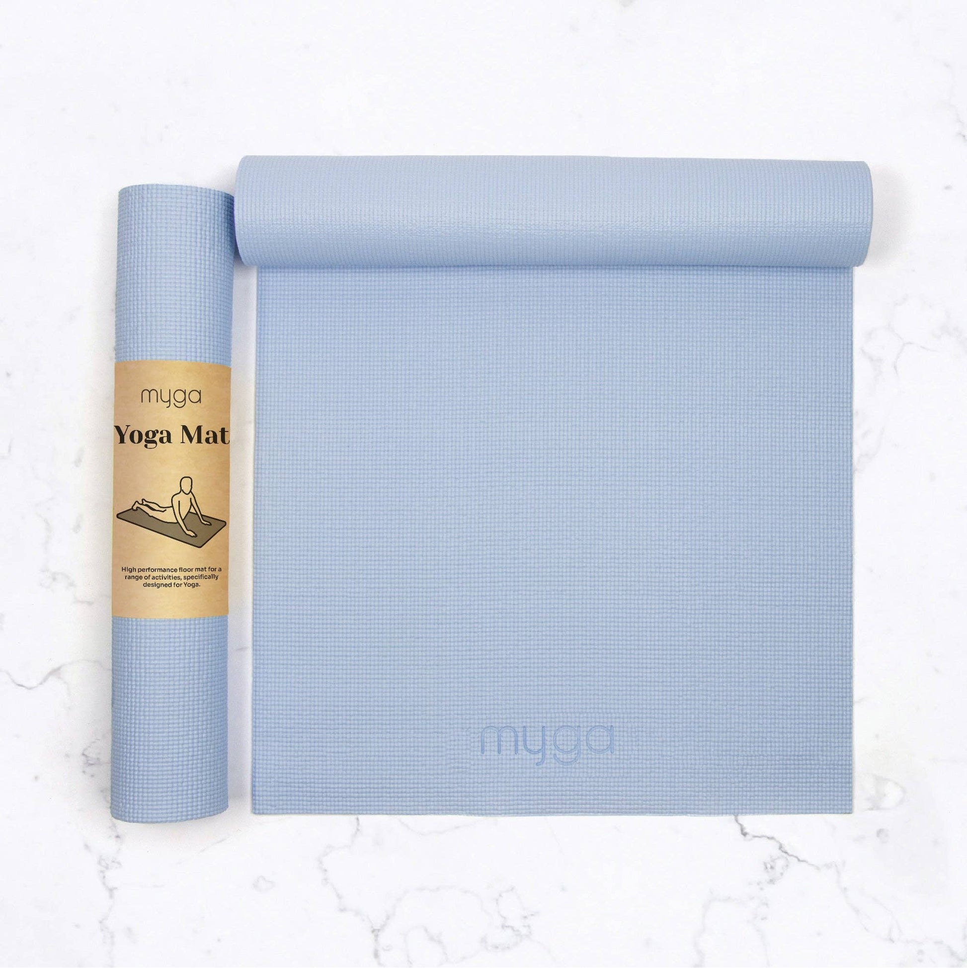 Aufgerollte hellblaue Myga Yogamatte mit braunem Papierbanderole auf weißem Hintergrund – rutschfest und ideal für Yoga oder Pilates.